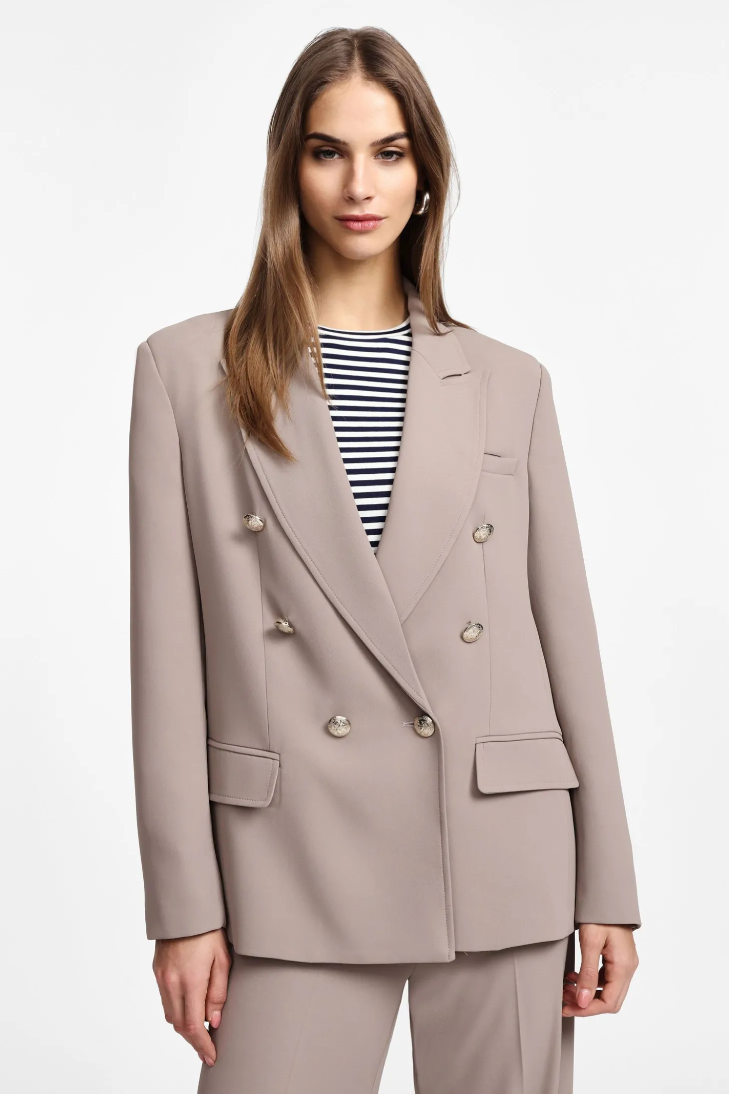 Blazer con botonadura doble y bolsillos
