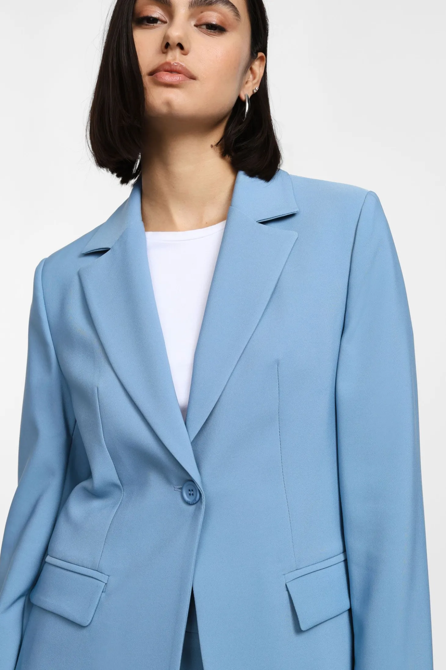 Blazer de botón único con bolsillos