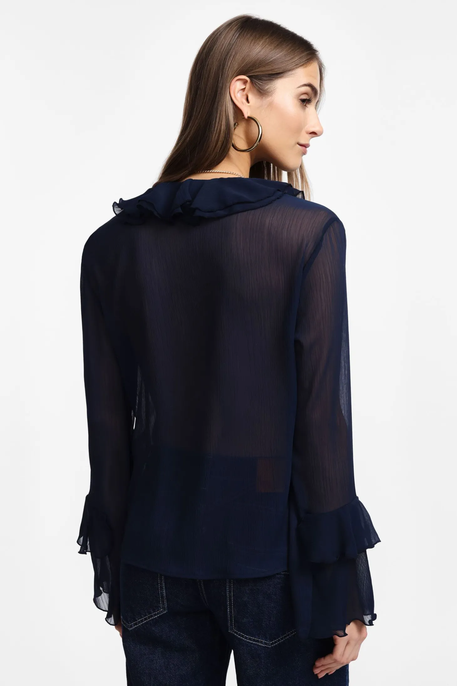 Camisa con mangas largas y volantes