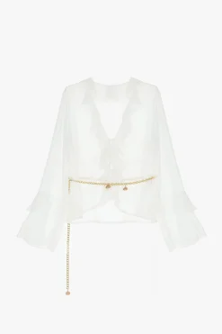 Camisa con mangas largas y volantes