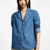 Camisa vaquera con bolsillos y botones