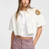 Chaqueta corta con botones y parche