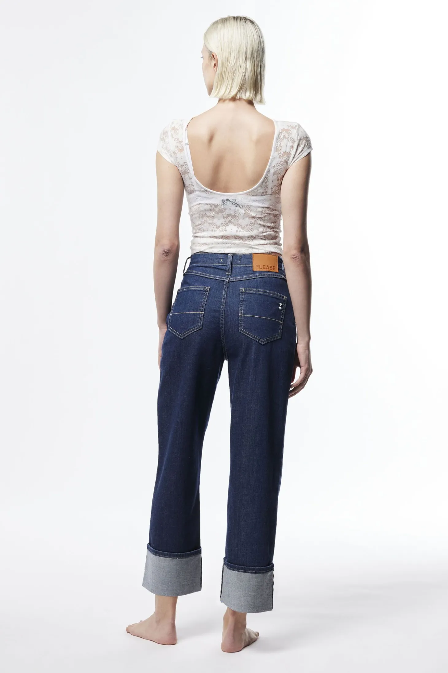 Jeans a gamba larga con risvolti