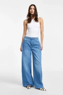 Jeans a gamba larga con vita media