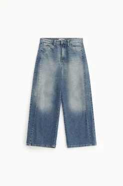 Jeans a gamba larga tapered con vita media