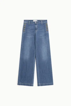 Jeans a zampa con bottoni laterali