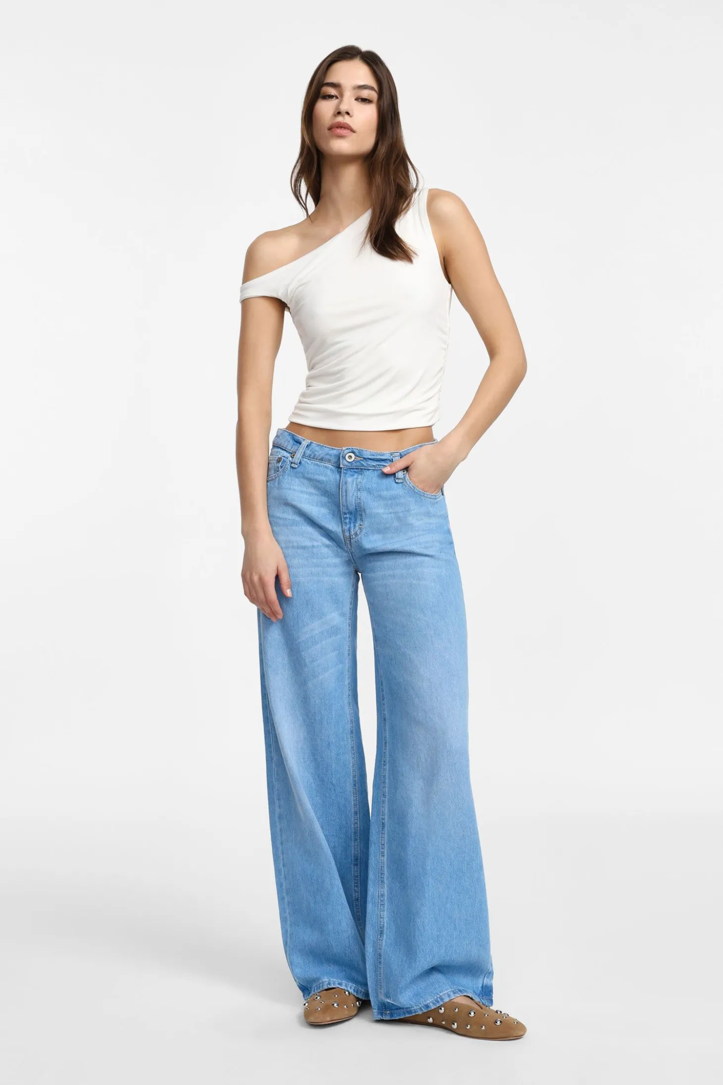 Jeans a zampa con vita bassa