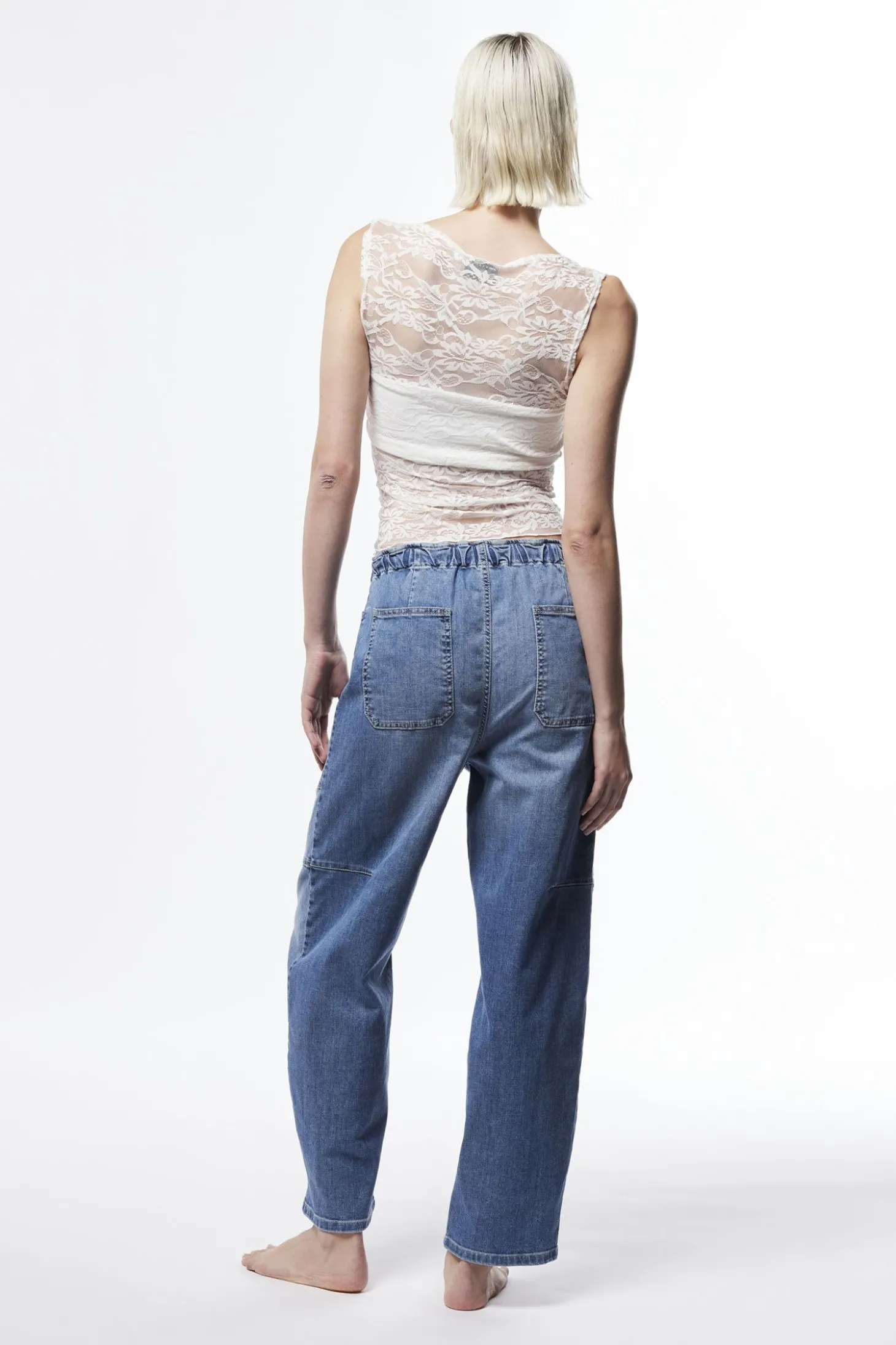 Jeans ampi paperbag con cuciture