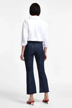 Jeans flare con paillettes e vita media