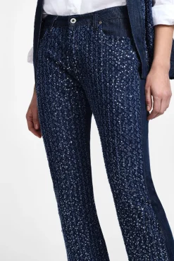 Jeans flare con paillettes e vita media