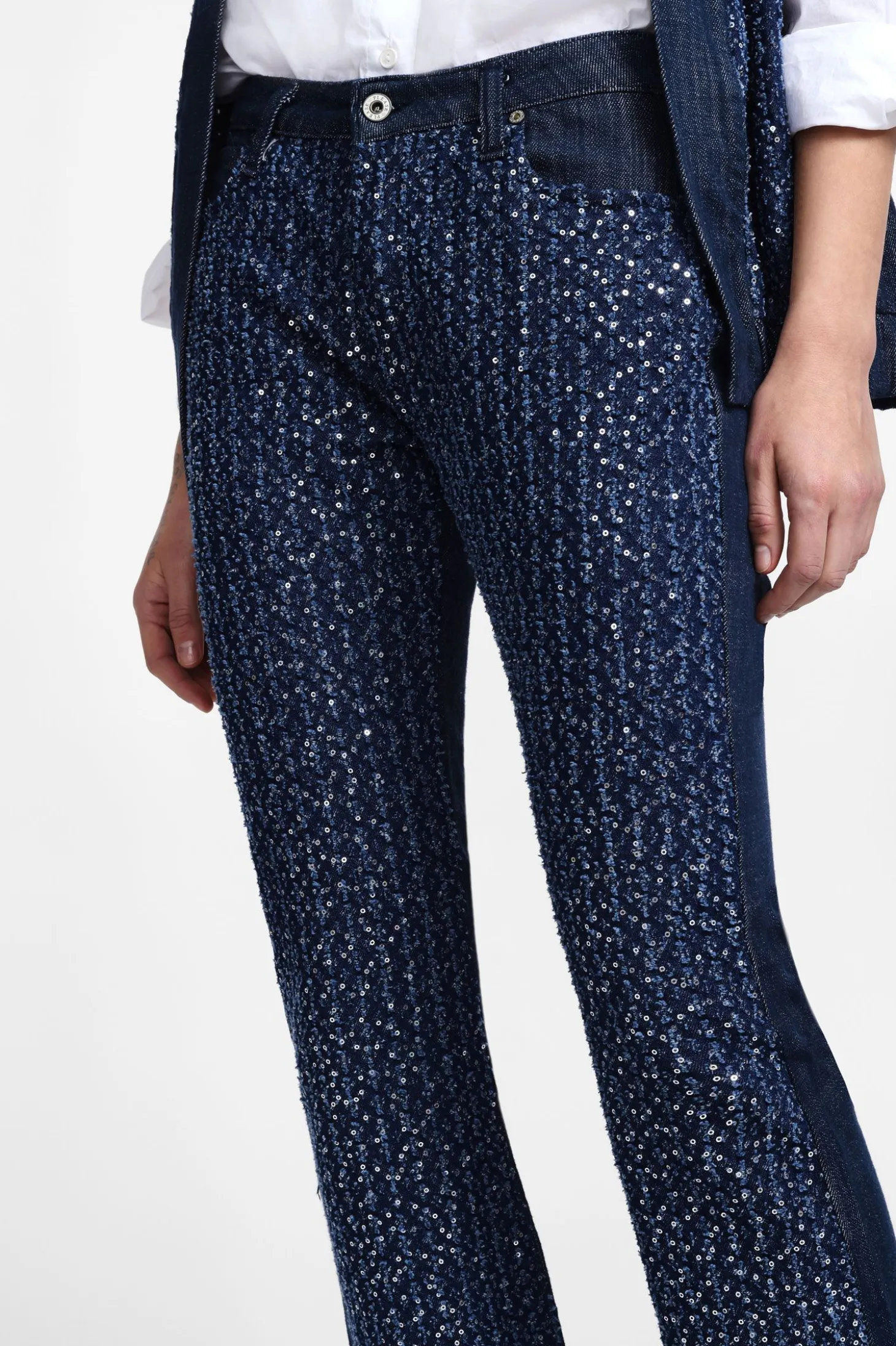 Jeans flare con paillettes e vita media