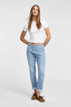 Jeans slim-fit effetto délavé con chiusura laterale e cuciture dettaglio