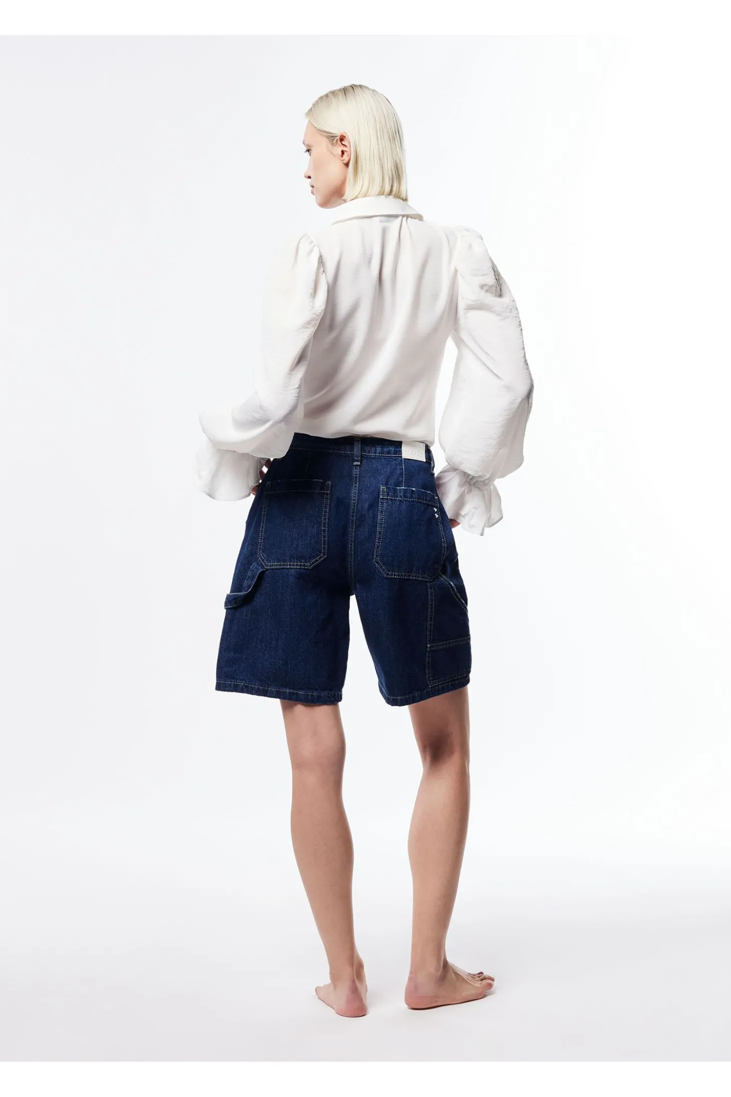 Pantalones cortos con bolsillos laterales