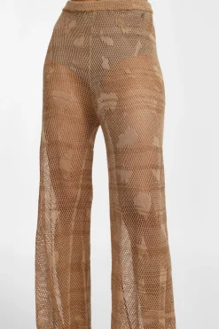 Pantalones perforados de pierna ancha