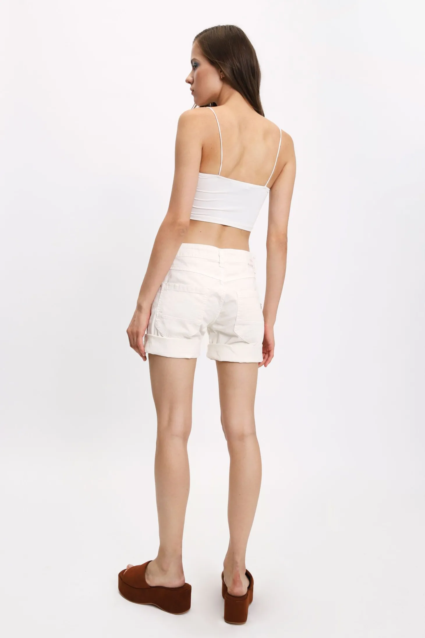 Shorts de color liso con dobladillo