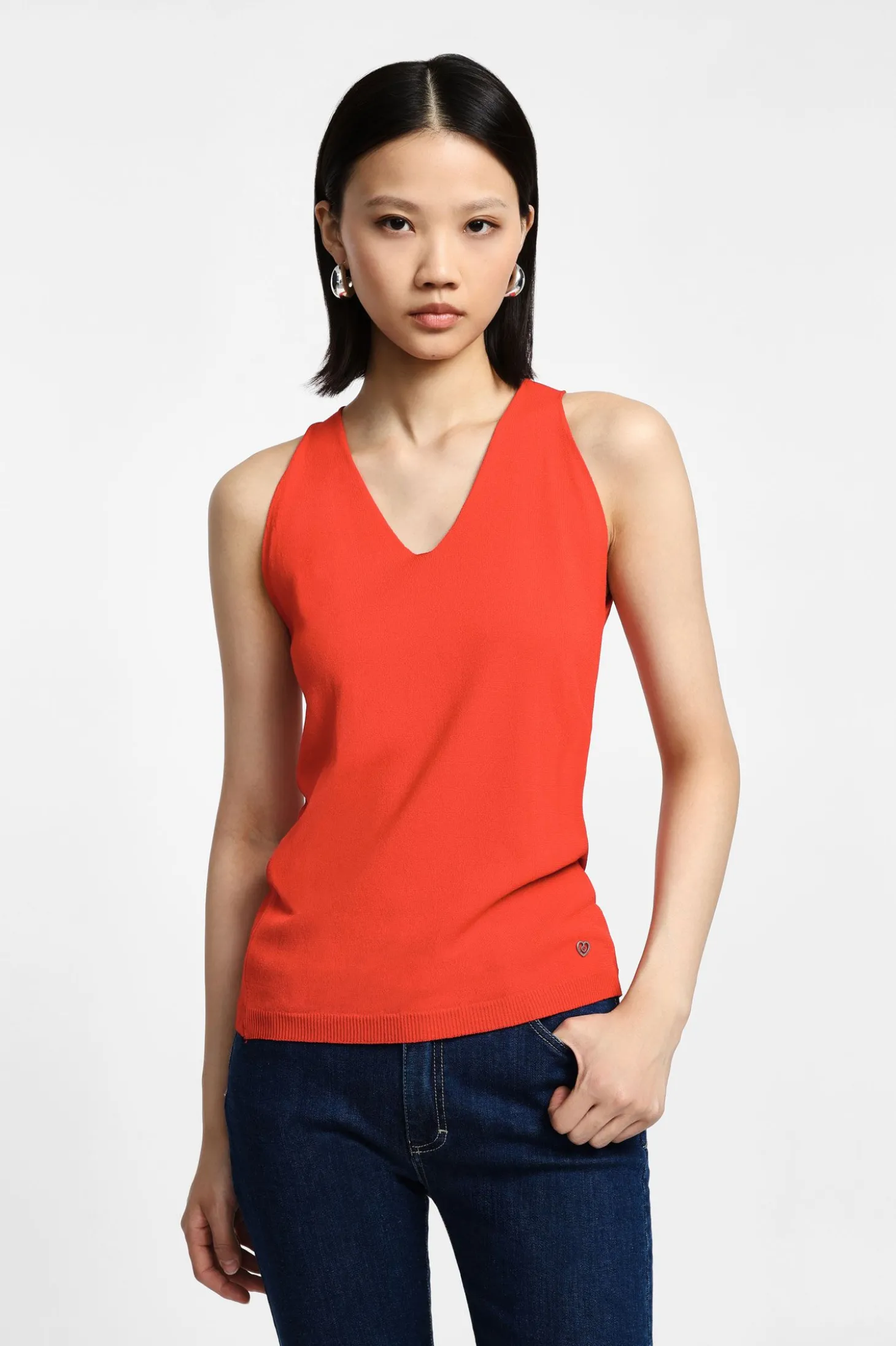 Top de punto sin mangas cuello v